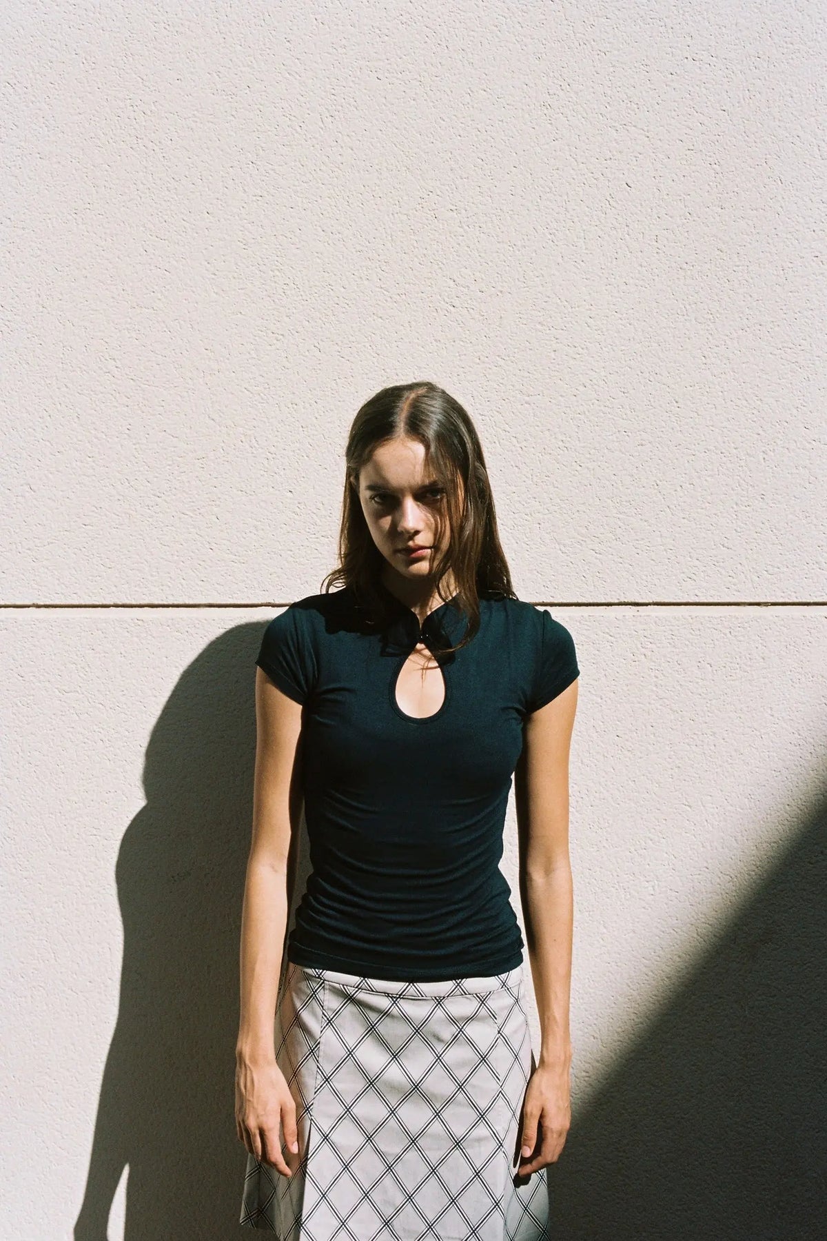 Meghane Top black short sleeve keyhole neckline model
