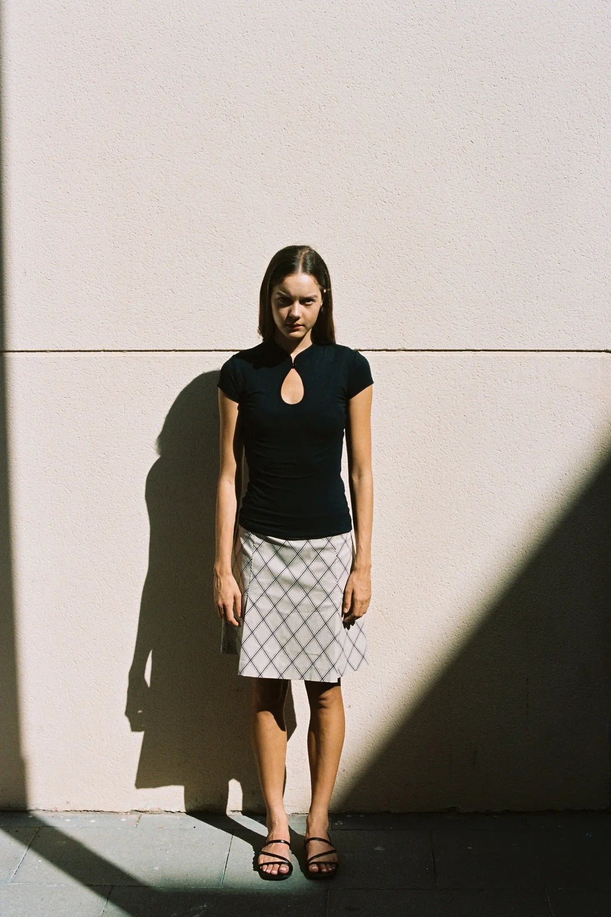 Meghane Top black fitted tee with white geometric skirt